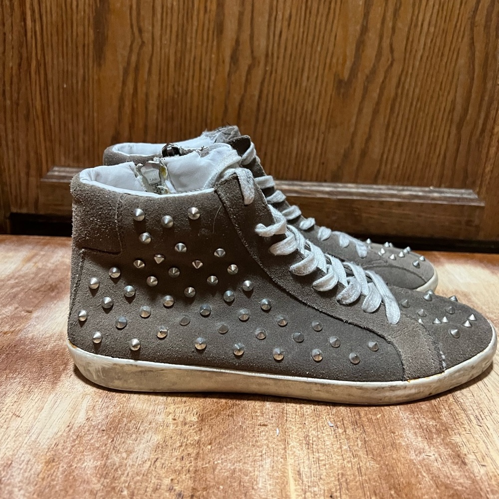 Womens size 8 grey studded Steve Madden high tops.